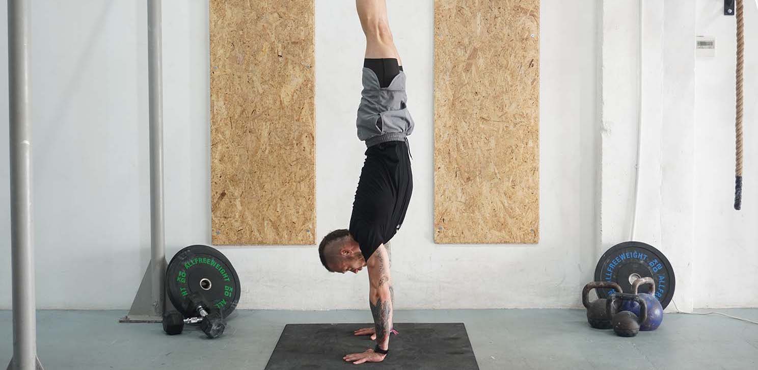 Handstand Push Up - How to Instructions and Modifactions