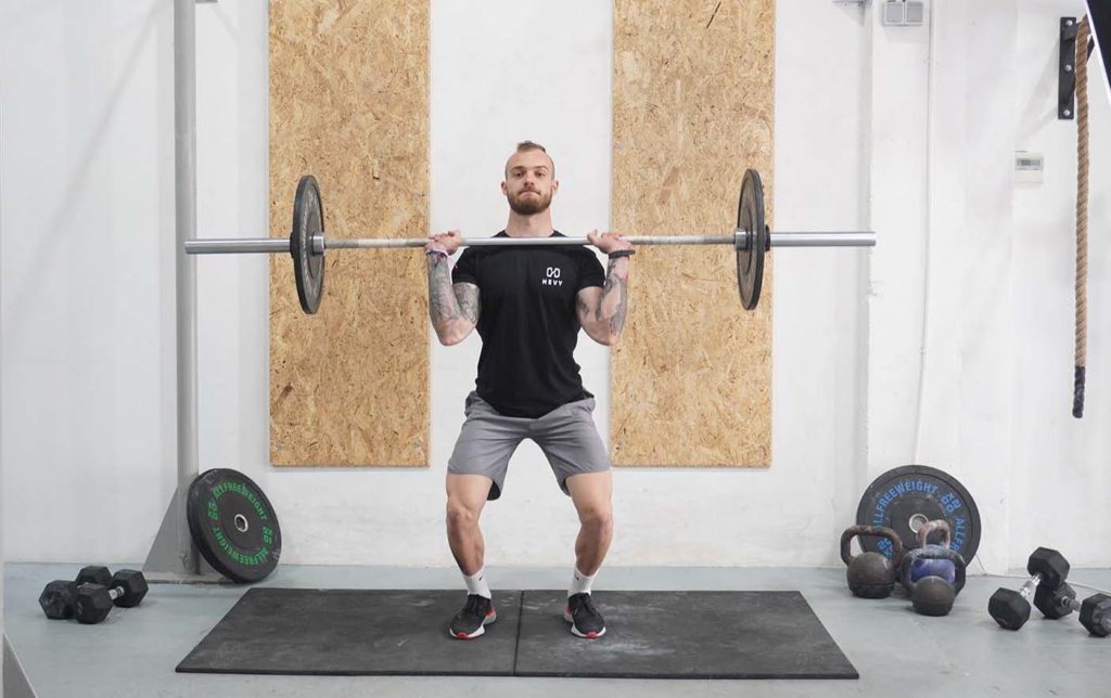 man push press knees bent barbell