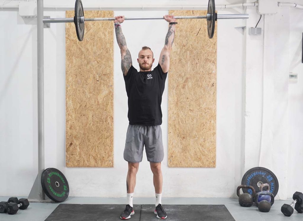 man push press arms extended barbell