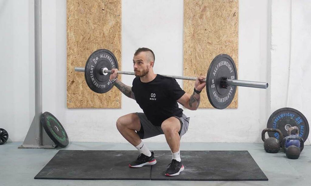 man barbell squat inner thigh workout