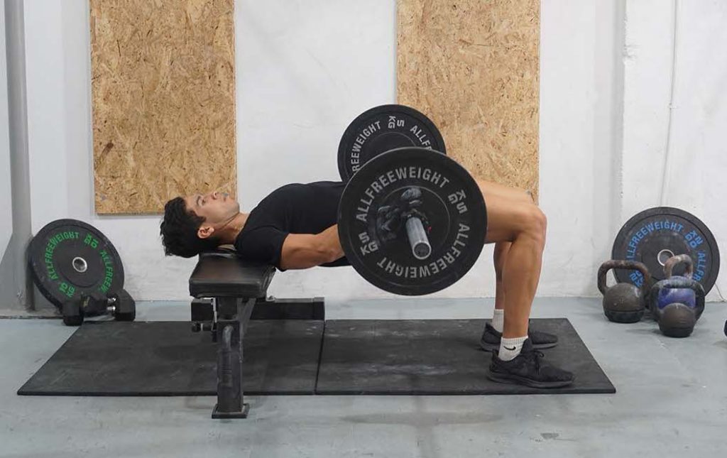 man hip thrust barbell glute compound exercises