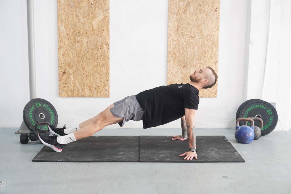 man reverse plank