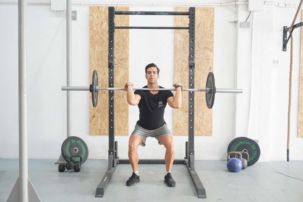 man 1/2 front squat barbell