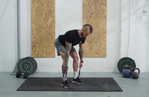 man deadlift band bent over