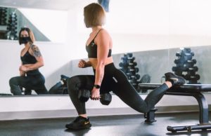 women split squat lower body dumbbell